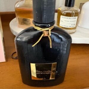 Tom Ford Black Bottle with Gold Accents